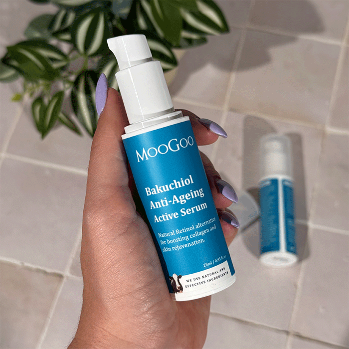 MooGoo Bakuchiol Anti Ageing Serum lifestyle shot on tiled background with plants, natural retinol alternative for collagen boosting and skin rejuvenation
