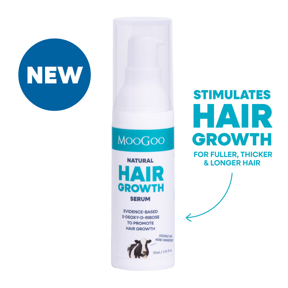 Moogoo Natural hair growth serum bottle with text on a white background. Stimulates hair groweth for fuller, thicker and longer hair. 
