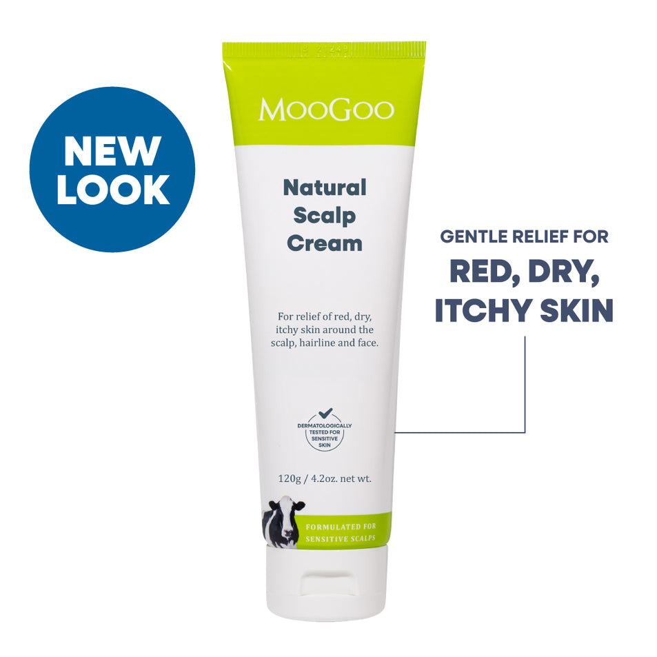 MooGoo Scalp Repair Cream in a white squeeze tube with a bright green cap, shown on a white background with text indicating relief for red, dry, and itchy skin. Olive Oil and Coconut Oil formula for seborrheic dermatitis and psoriasis. 
